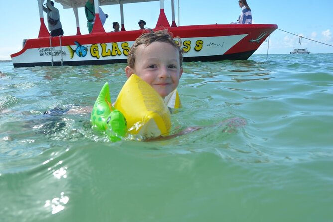 3 hrs Glass Boat Tour in Punta Cana - Stop 1 at Bavaro Beach: quick dolphin spotting from the water
