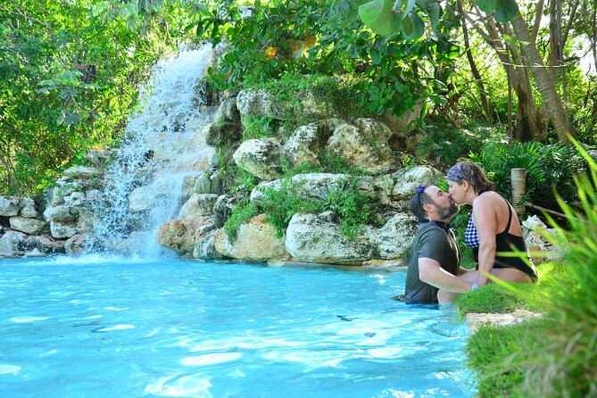Buggy Ride, Cenote and Waterfall Pool at Bavaro Adventure Park - The Cenote Blue Lagoon stop: cold water and a big visual payoff