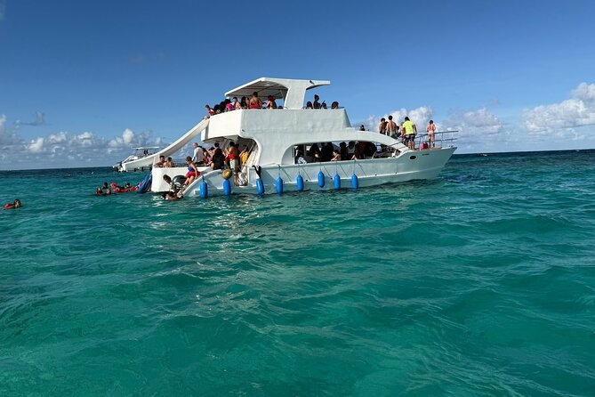 Catamaran Booze Cruise And Snorkeling Punta Cana - Adults Only - Crew Energy, Dance Music, and the Photo Sales Reality Check
