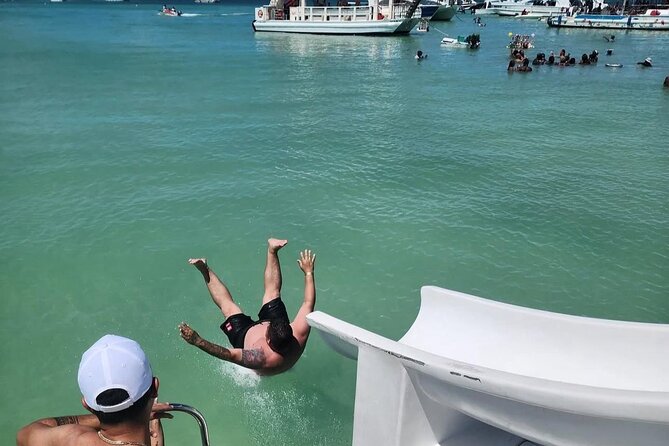 Catamaran party in Punta Cana with open bar, music and more - The Open Bar Reality: What Unlimited Drinks Means
