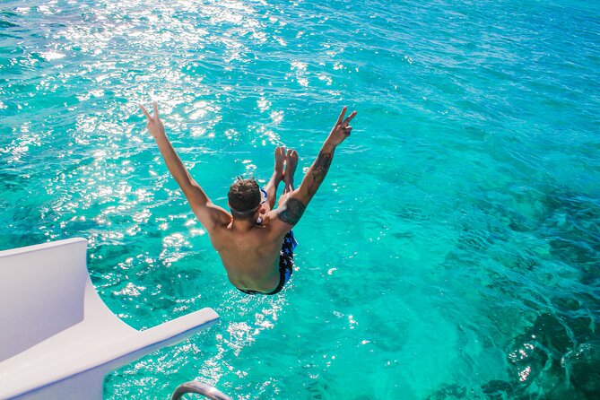 Float & Feast Private Party Cruise with Premium Buffet & Open Bar - Onboard Entertainment: Dominican Dancers, Photos, and the Slide Factor