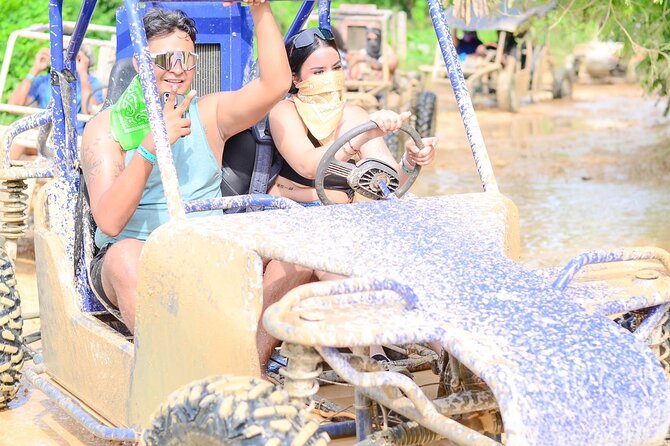 Full-day Buggy & Party Boat tour: snorkel, open bar, cave pool - Catamaran cruise and snorkeling: gear included, fish on the menu