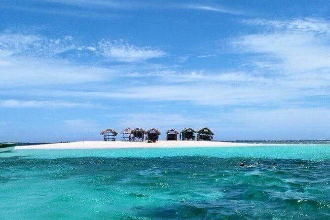 Full-Day Tour Isla Bonita Deluxe - The natural pool stop and slide moment: fun water, Caribbean music, and cider