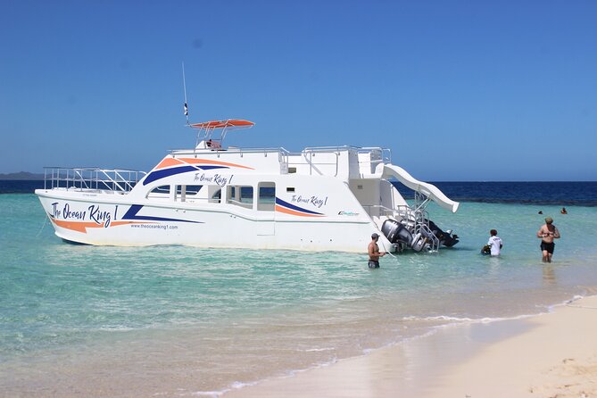 Full-Day Tour Isla Bonita Deluxe - The morning start: pickup, catamaran heading out, and why timing matters