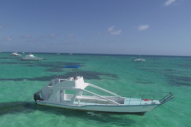 GlassBottom Catamaran with Slide - Snacks, tropical fruit, and an open bar that keeps the cruise party-friendly