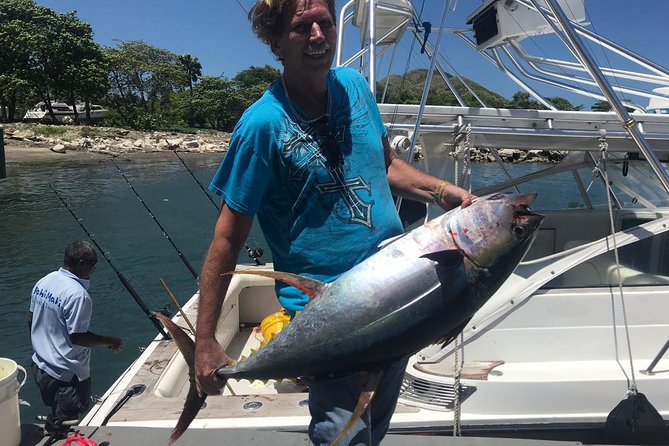 Half Day Big Game Fishing private charter - The Trojan 34 ft boat and a crew that gets to work