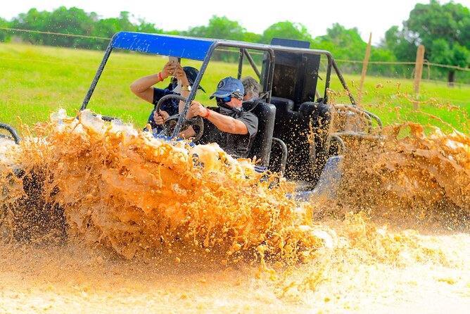 Half-day buggy adventure cenote and Macao beach in Punta Cana - Los Hoyos del Salado cenote: jumping into a 25-foot water cave