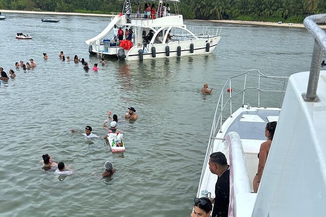 Half-Day Tour with Punta Cana Beach Boat Party - Punta Cana Natural Pool: snorkeling in shallow water and starfish photos
