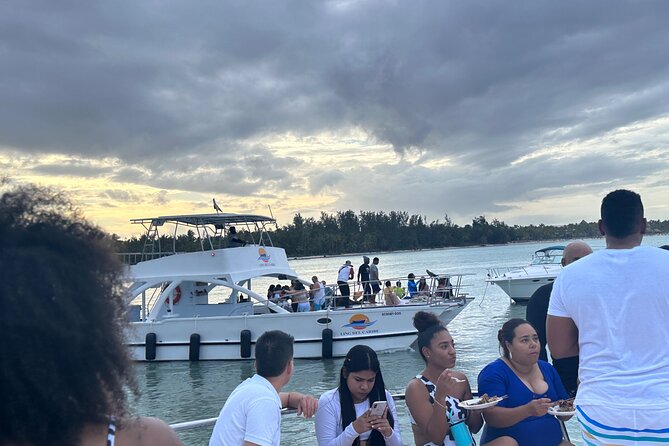 Half-Day Tour with Punta Cana Beach Boat Party - Playa Bibijagua dolphin viewing from the boats