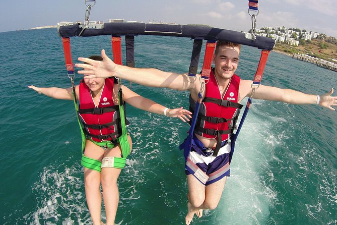 Parasailing, Snorkel Cruise & Virgen Beach from Punta Cana - Parasailing over the Cortesito-Bavaro coastline, harnessed and ready