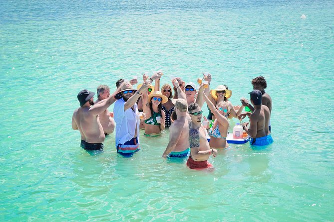 Private Catamaran Booze Cruise & Snorkeling - Extra costs to know: beach lunch, photos, and souvenirs