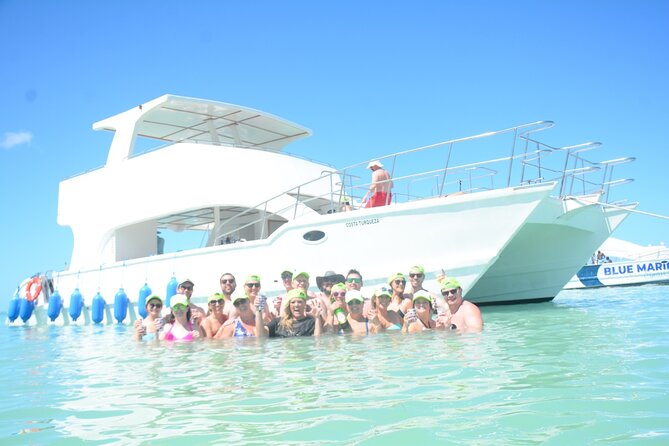 Private Catamaran with Sound system, Slide, Open bar & Snorkeling - Natural Pool sandbar stop: calm water plus a floating bar