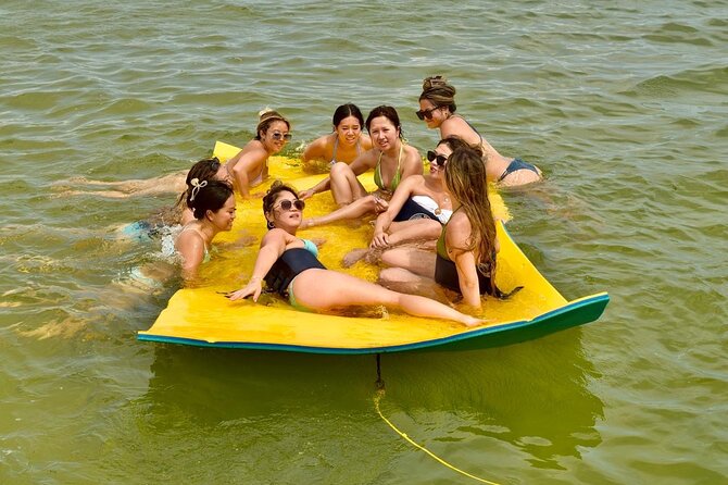 Private Cruise Party and Snorkeling in Punta Cana - Onboard water slide and how the music keeps the day moving
