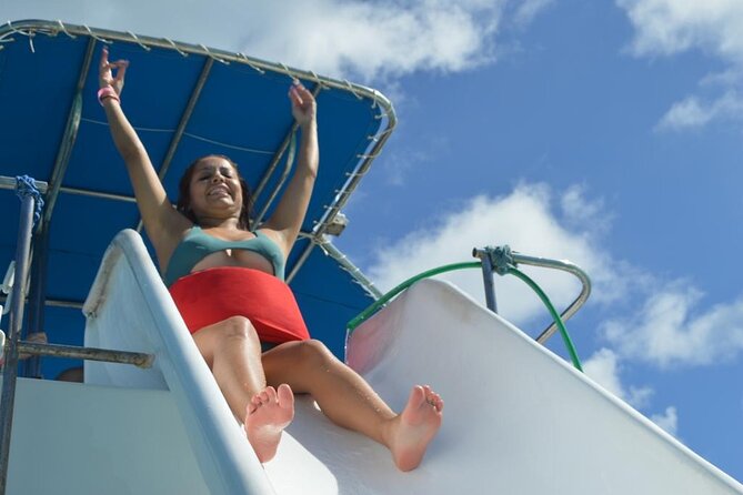 Private Party Boat with Slide and chicken skewers at Punta Cana - Photo Costs, Towels You Need to Bring, and Weather Matters