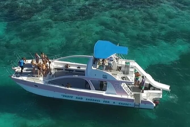 Private Party Boat with Slide and chicken skewers at Punta Cana - Natural Pool Sand Bar Hour, Floating Bar Snacks, and BBQ Kebabs