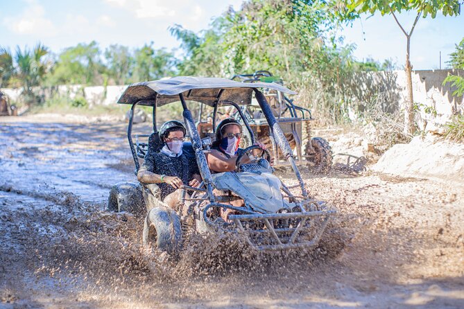 Punta Cana 4 Hours Buggy Tour Cave Macao Beach Free Pick Up - Cueva Taína cenote: the cave with illuminated stalactites and stalagmites