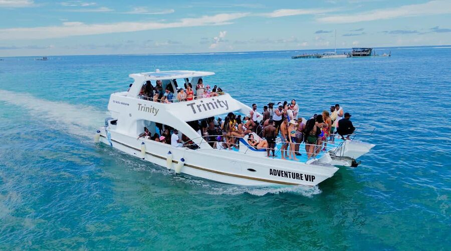 Punta Cana: Party Boat with Snorkeling, Open Bar And Hip Hop - Entering the vibe: the yacht setup and party energy