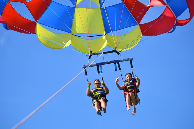 Punta Cana Party Cruise with Snorkeling, Hooka Diving and Parasailing - Parasailing Over Punta Cana: Smooth Flight, Photo Moments, and Wait Time