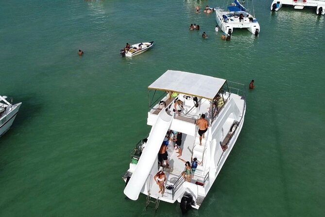 Punta Cana Private Boat Tour with Open Bar and BBQ - Staff, music, and the human side of service