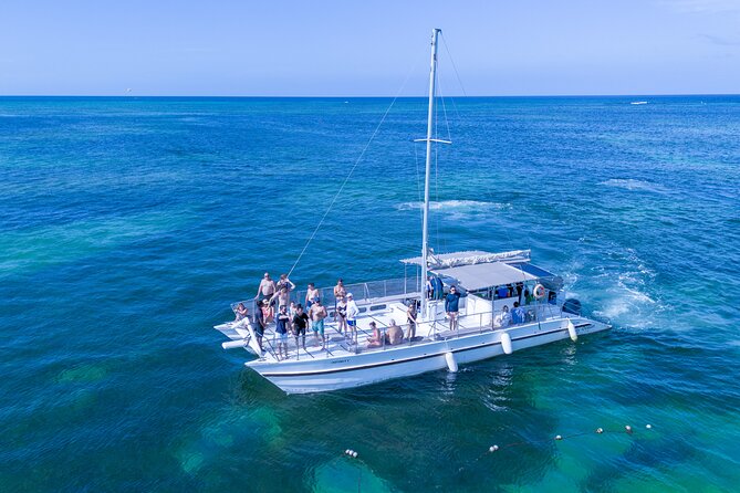 Punta Cana Private Catamaran Cruise: Snorkeling, Beach & BBQ - Natural pool stop: wade time, drinks in hand, music in the background