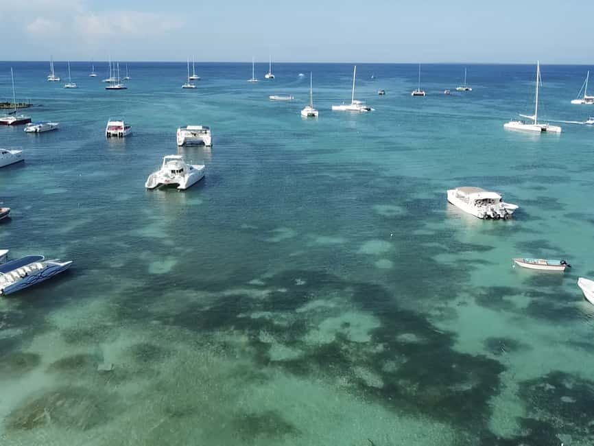 Punta Cana: Saona Island Day Trip with Blue Lagoon & Lunch - Boat noise, photo sales, and other on-the-ground reality checks