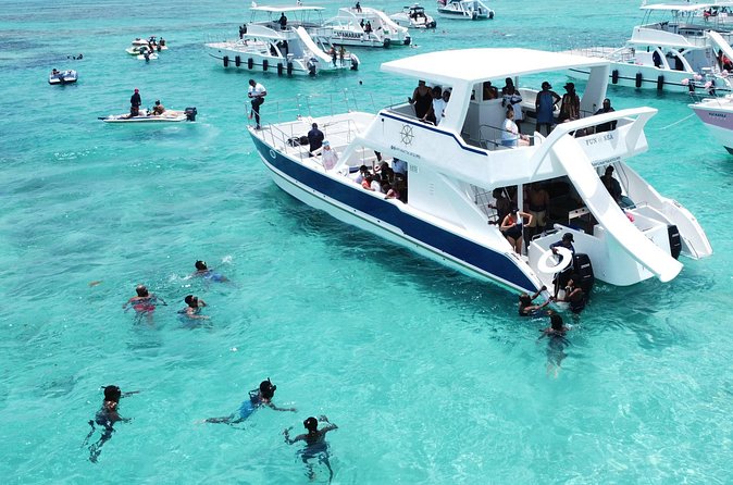 Punta Cana Shared Party Boat Booze Cruise and Snorkeling - Natural Pool: Waist-High Water and the Boat Crowd