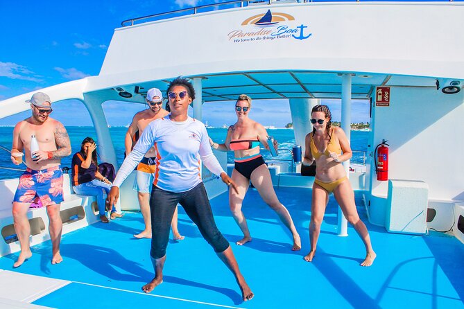 Punta Cana VIP Party Cruise with Snorkeling & Double Slide - Natural swimming pool time, snacks, and the open bar
