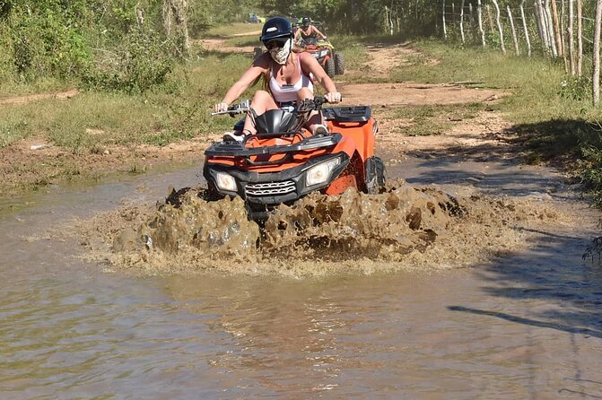 River Cave and Macao Beach Half-Day Quad Bike Adventure - Macao Beach stop: crystal-clear water, but plan your timing