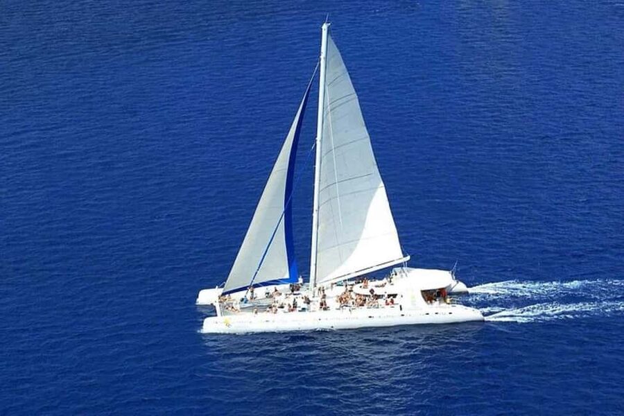 Saona Island: Catamaran/Speedboat Tour to a Dream Beach - The catamaran cruise: rum, music, and Cotubanama National Park views
