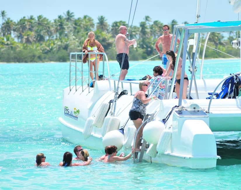 Saona island small group boat with water slide with lunch - Boat time from Bayahibe: speedboat energy, music, and a waterslide