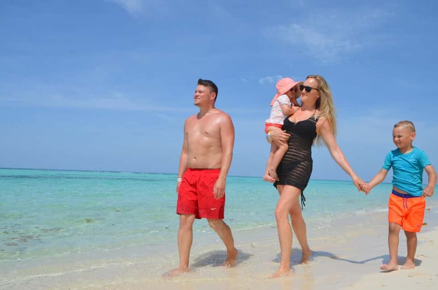 Saona Special Tour: 4 Beaches with Canto from Punta Cana - Mano Juan: quick village time for local color and shopping