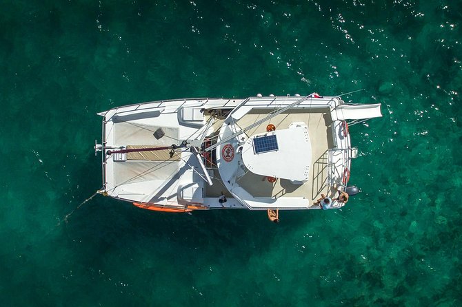 Small Group Snorkeling Cruise with Open Bar and Light Snacks - Getting There: Hotel Pickup, Plaza Bibijagua Start, and Drop-Off