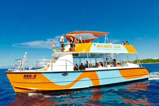 VIP Party Boat & Snorkeling - The sailing portion: coastline views and a catamaran that sets the pace