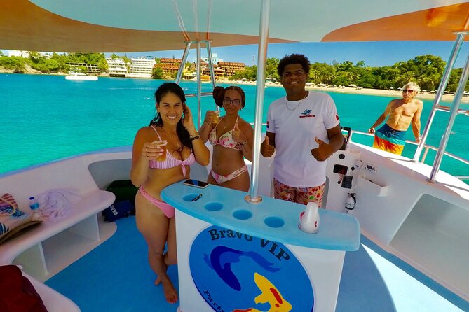 VIP Party Boat & Snorkeling - Dolphins and more: Dolphin Island, stingray and shark tank, then a natural pool