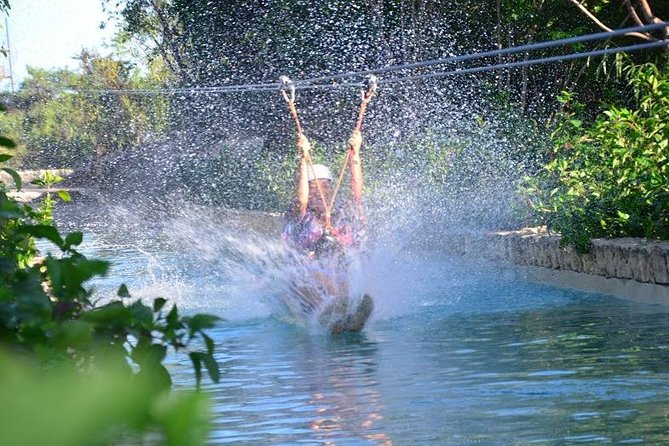 Zipline Mega Splash at Bavaro Adventure Park - What happens after you zip: waterfall pool and park access